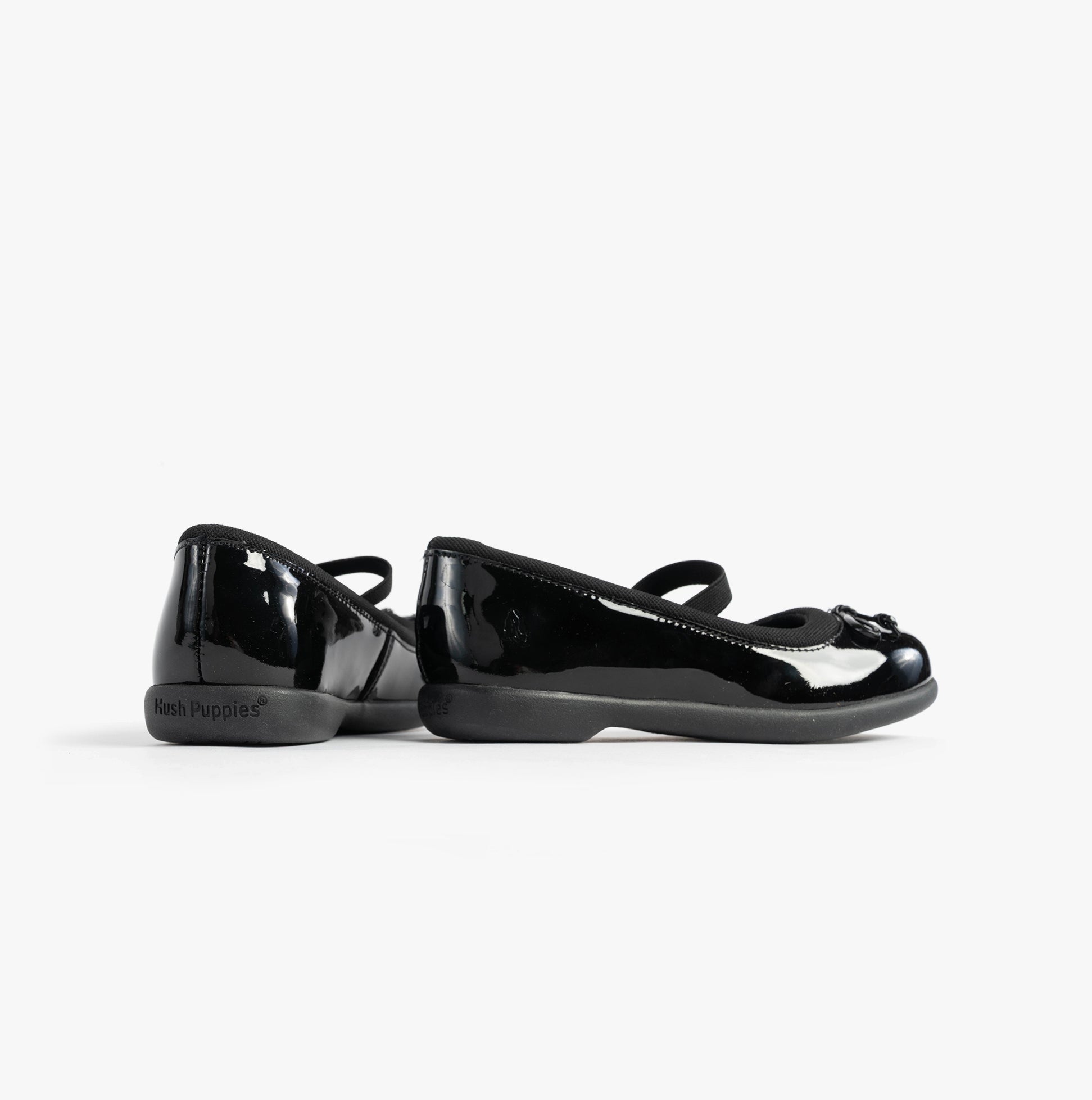 Hush Puppies BETTY PATENT JNR Girls Shoes Black side view showcasing glossy patent leather and round toe design.
