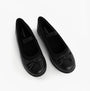 Hush Puppies BETTY JNR Girls Shoes Black top view showcasing classic slip-on style and round toe design.