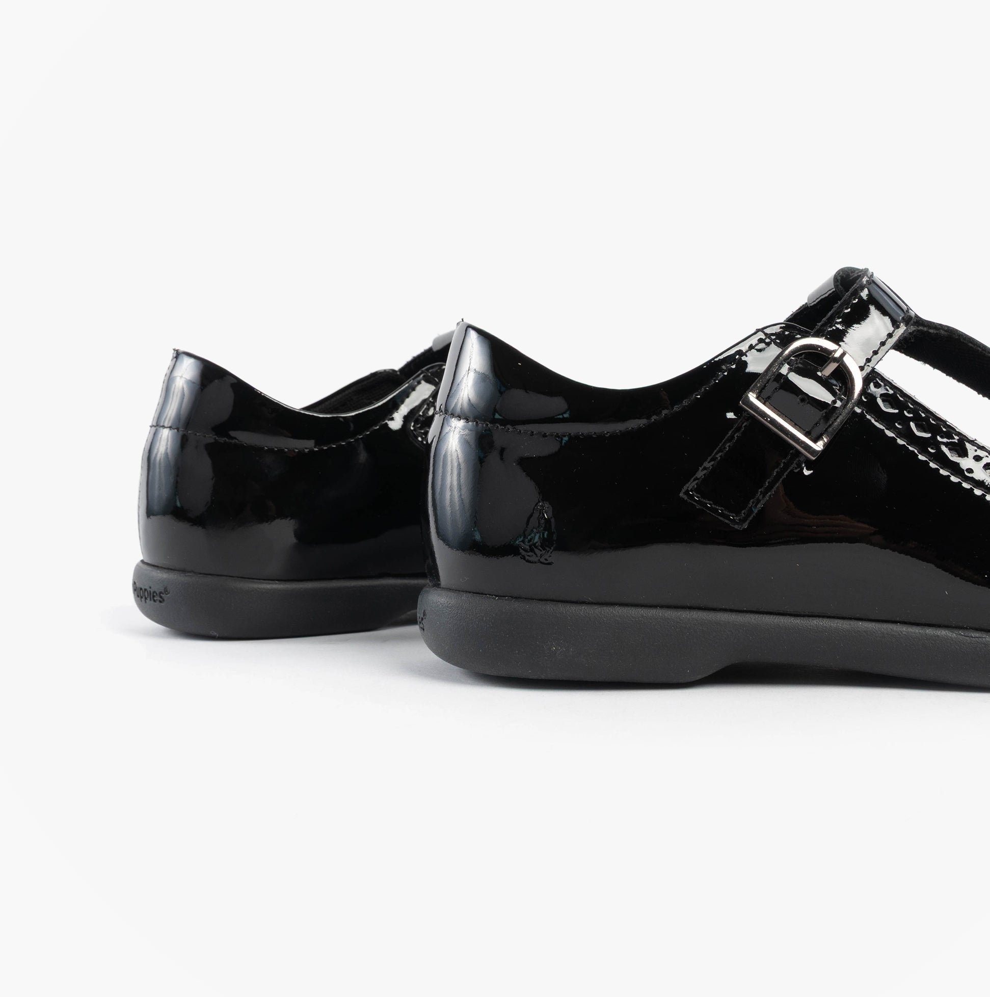 Hush Puppies BRITNEY PATENT Girls Shoes Black side view, featuring patent leather with buckle closure.