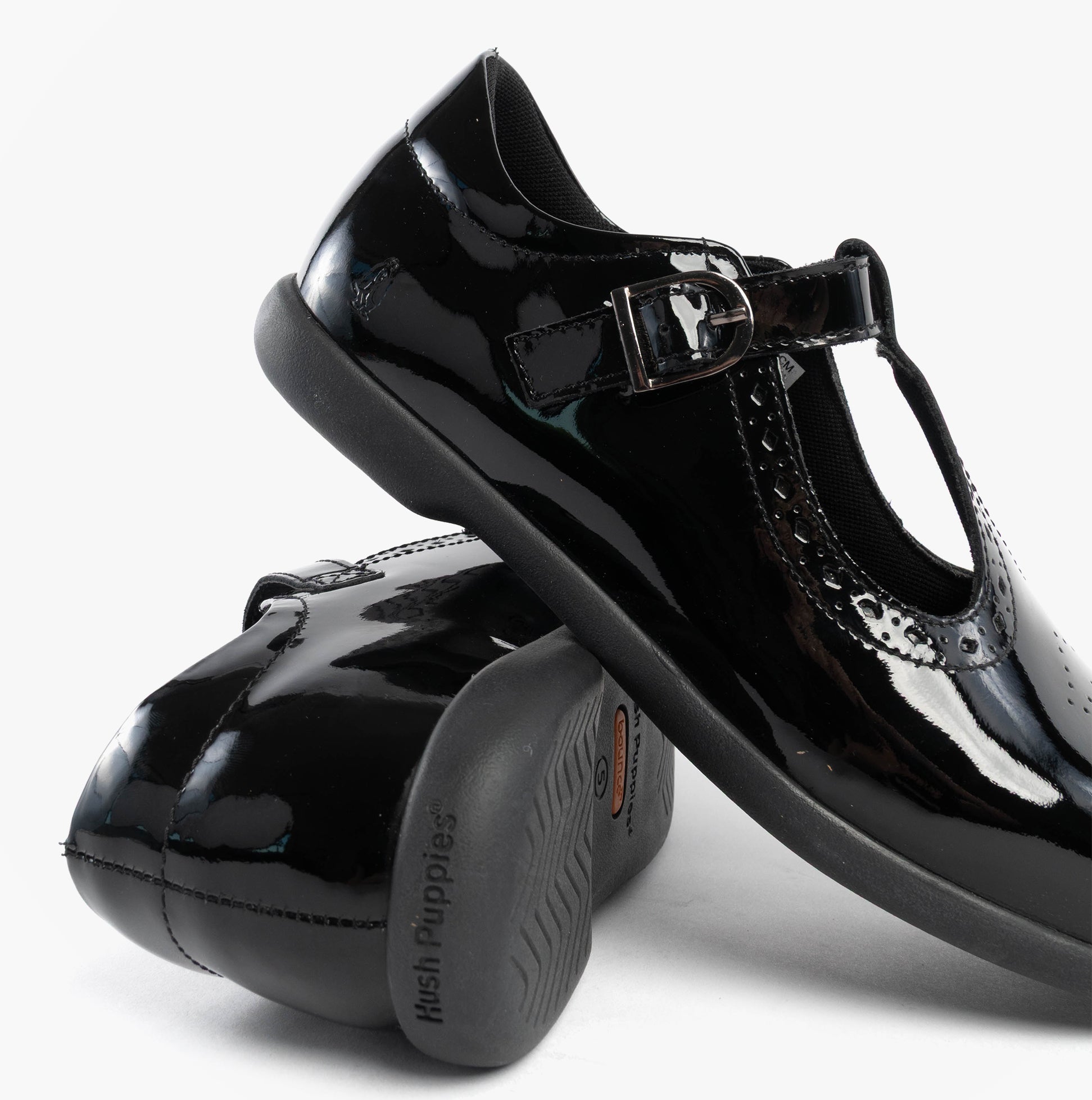 Hush Puppies BRITNEY PATENT Girls Shoes Black side view showing patent leather and buckle closure.