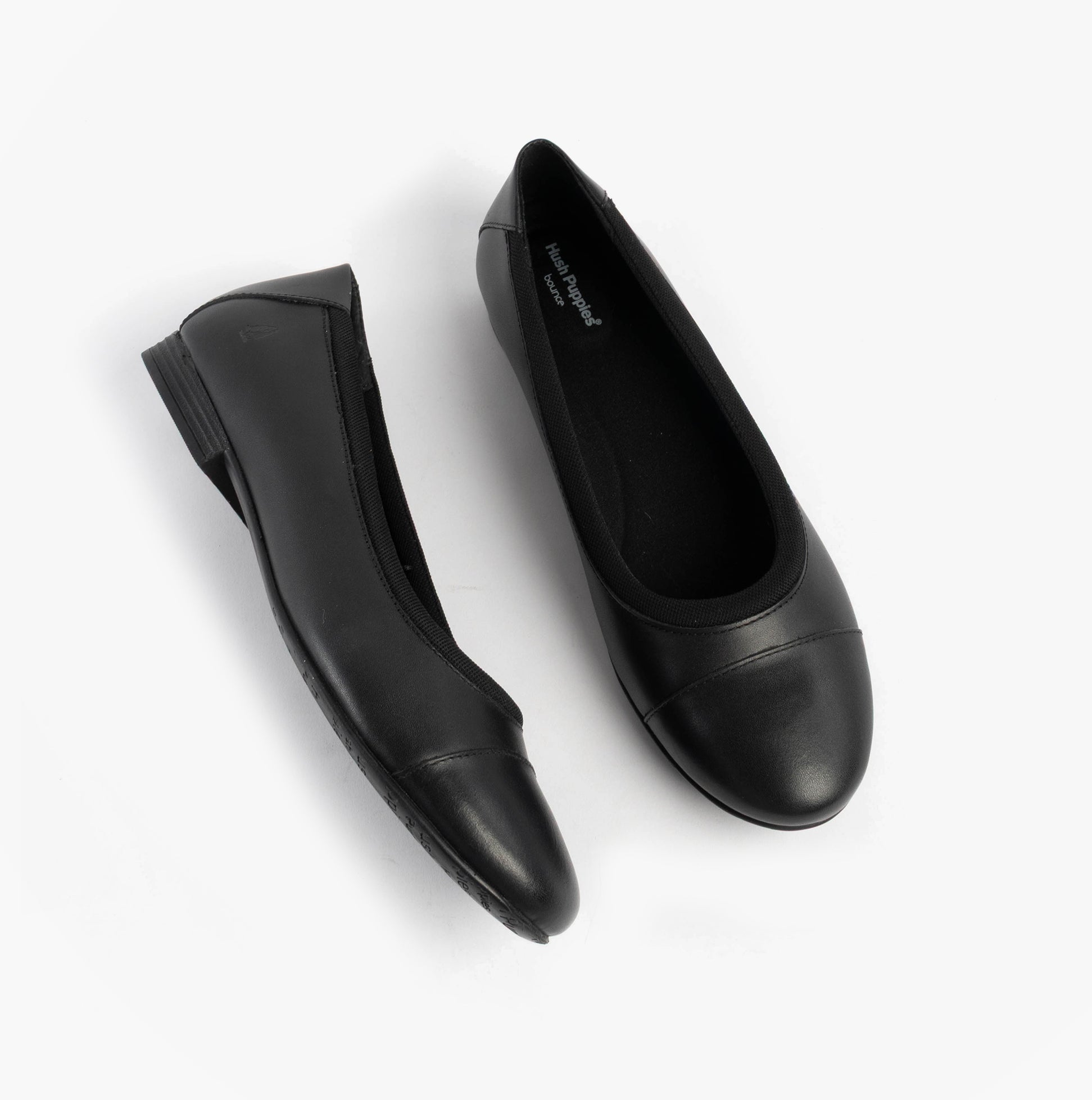 Hush Puppies EMMA Girls Leather School Shoes Black side view showing sleek design and round toe.