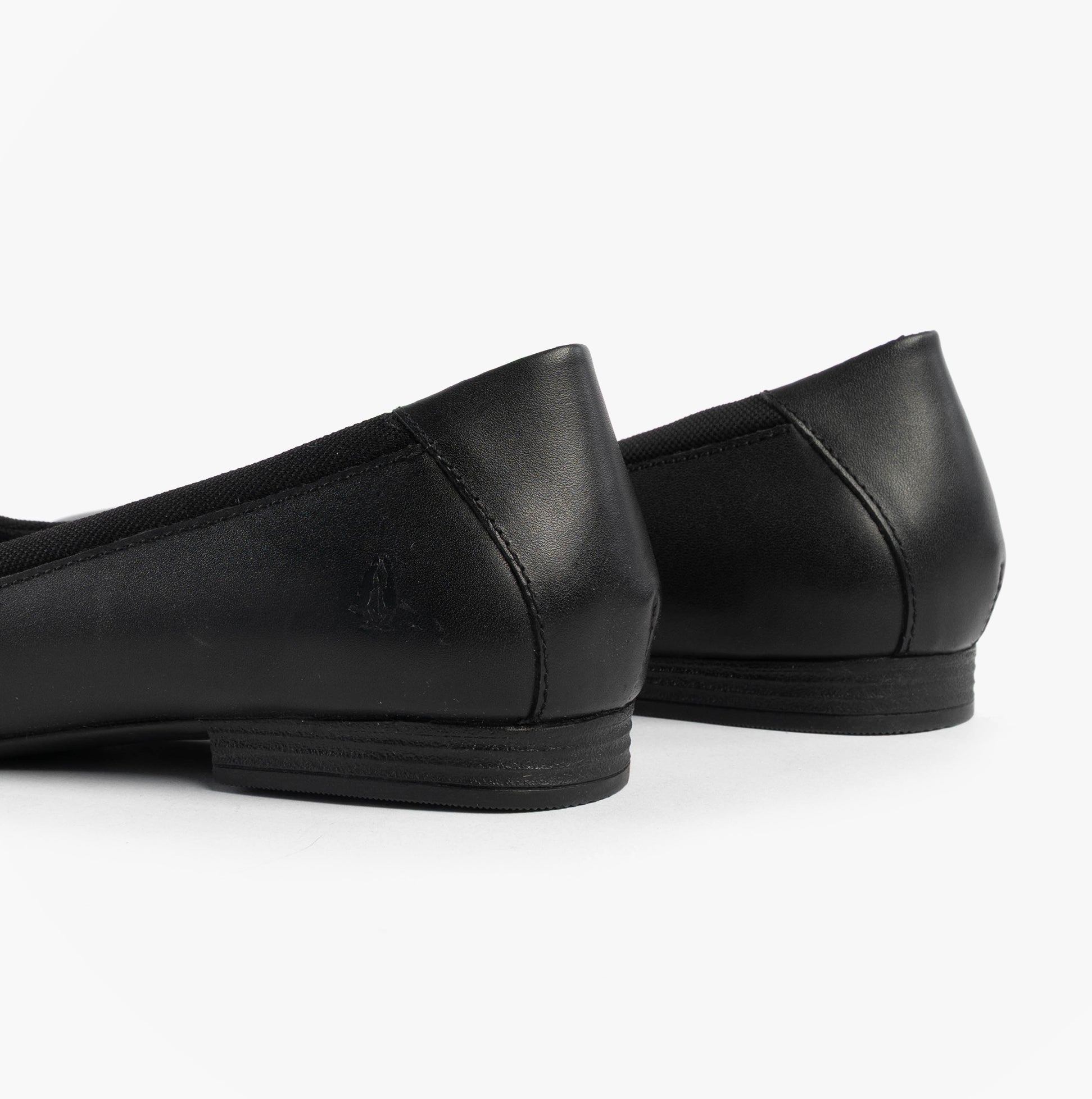 Hush Puppies EMMA Girls Leather School Shoes Black back view showcasing soft leather material and flat heel design.