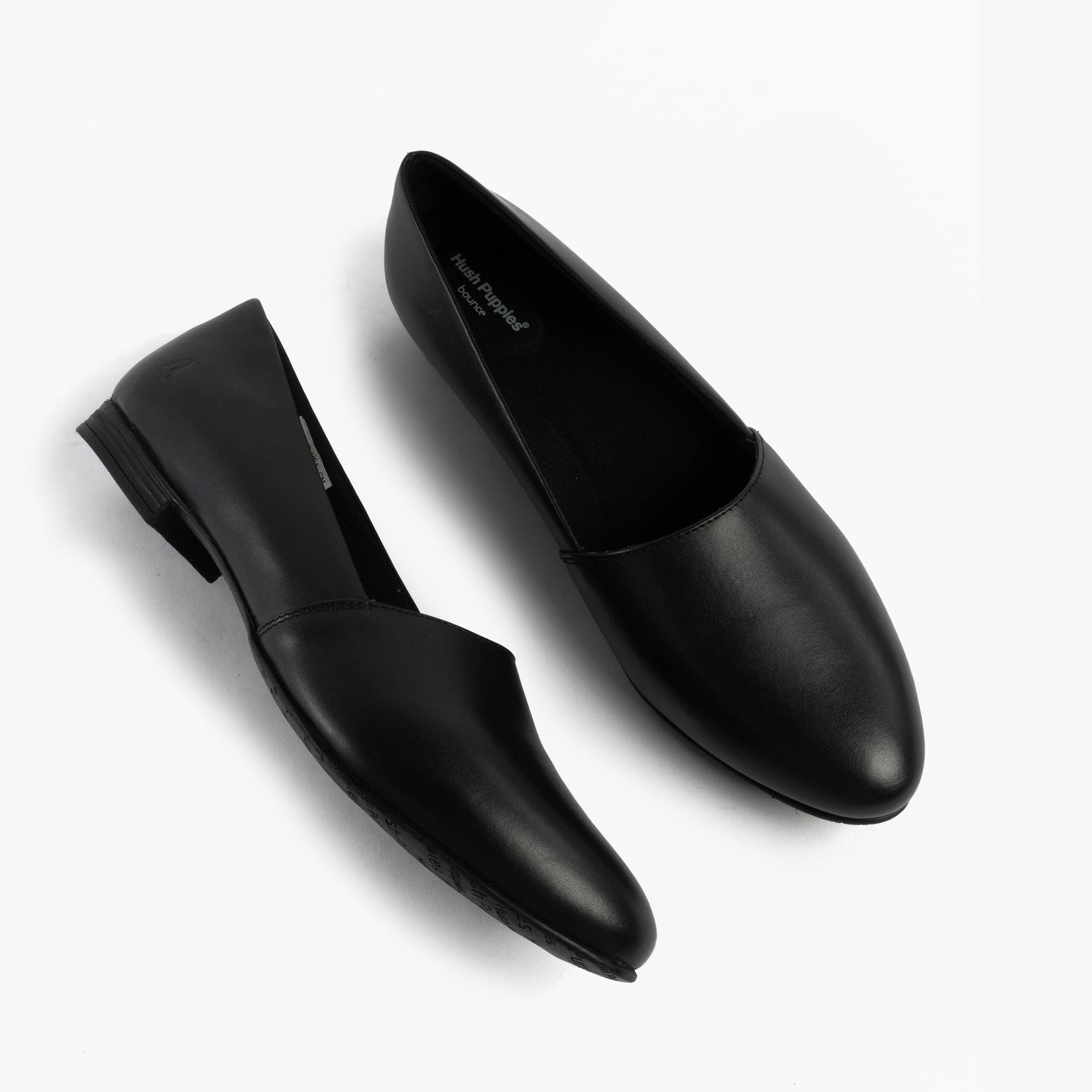 Hush Puppies LOLA Girls School Shoes Black top view showcasing leather design and slip-on style.
