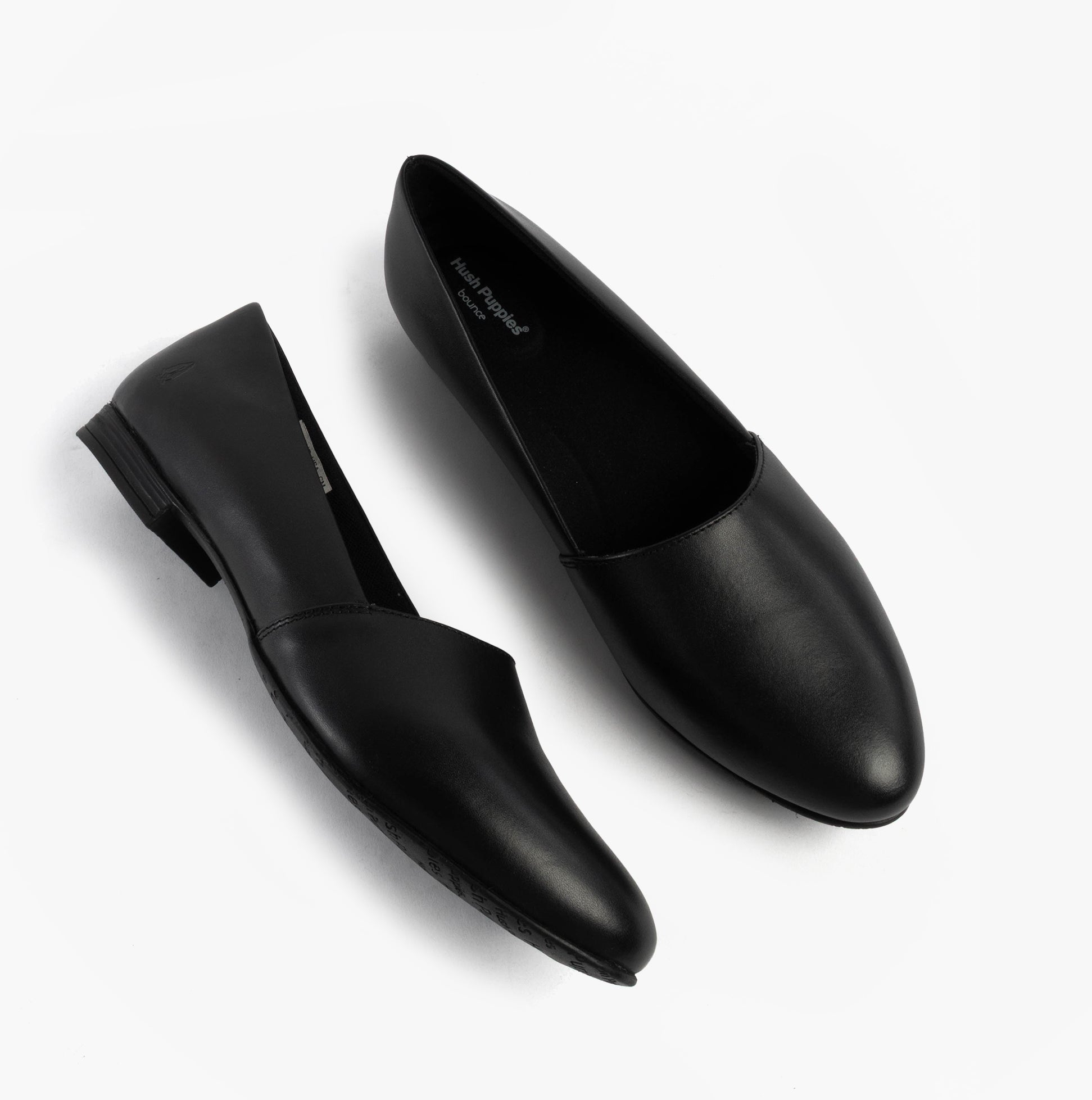 Hush Puppies LOLA Girls School Shoes Black top view showcasing leather design and slip-on style.