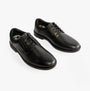 Hush Puppies TOMMY Boys Leather School Shoes Black, side view showcasing lace-up design and shiny leather upper.