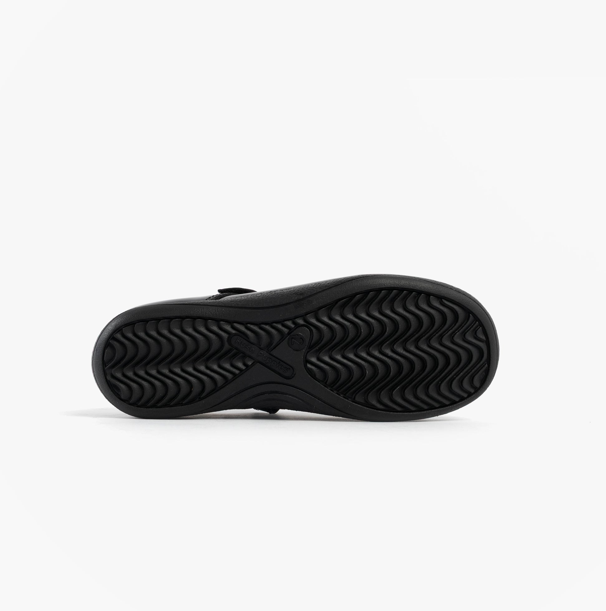 Hush Puppies CHRISTINA PATENT JUNIOR Girls Shoes Black bottom view showing flat TPR sole with textured pattern.