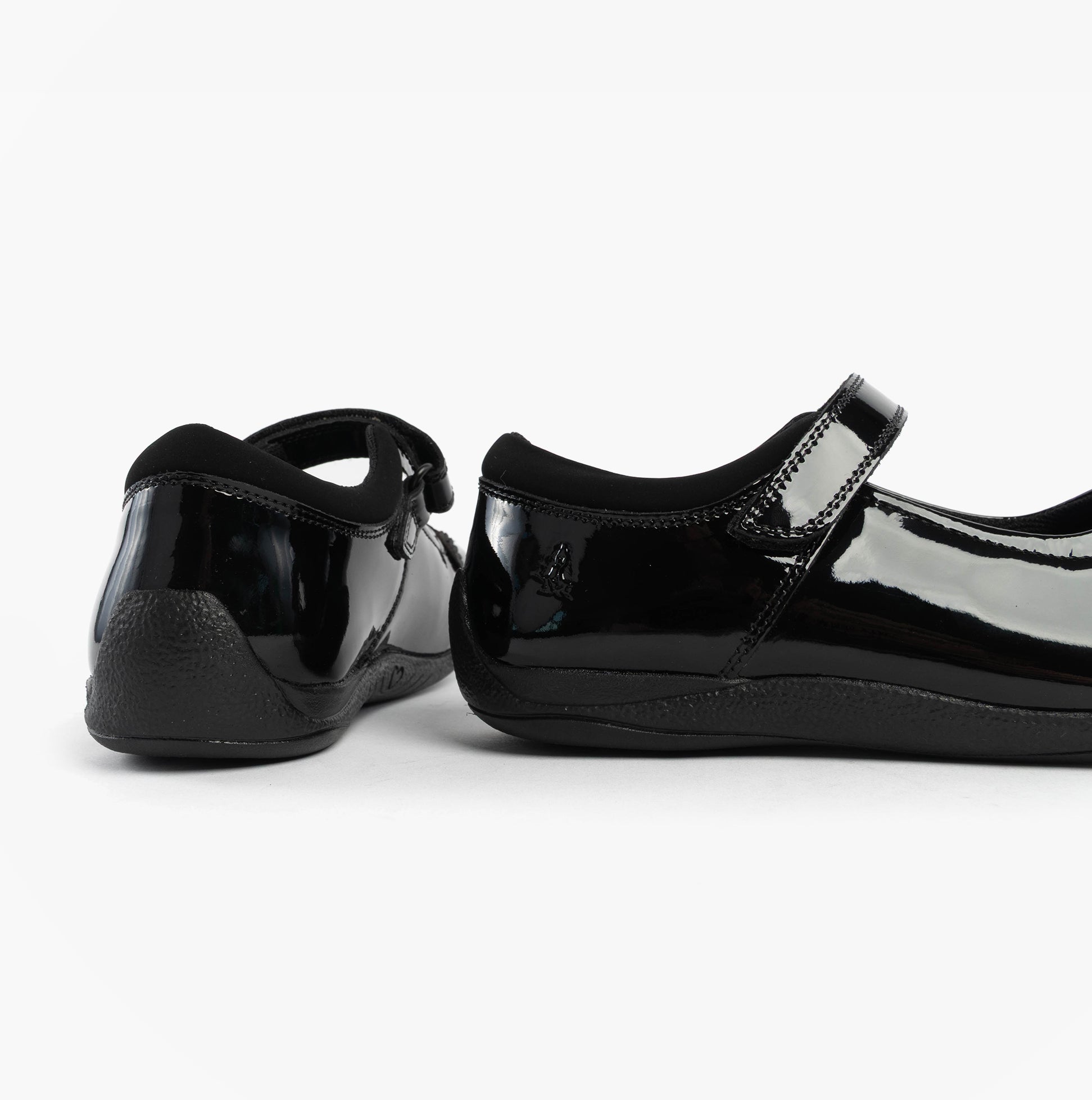Hush Puppies CHRISTINA PATENT JUNIOR Girls Shoes Black side view showcasing patent leather and touch fastening.