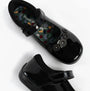 Hush Puppies CHRISTINA PATENT JUNIOR Girls Shoes Black, top view showcasing patent leather and floral design.