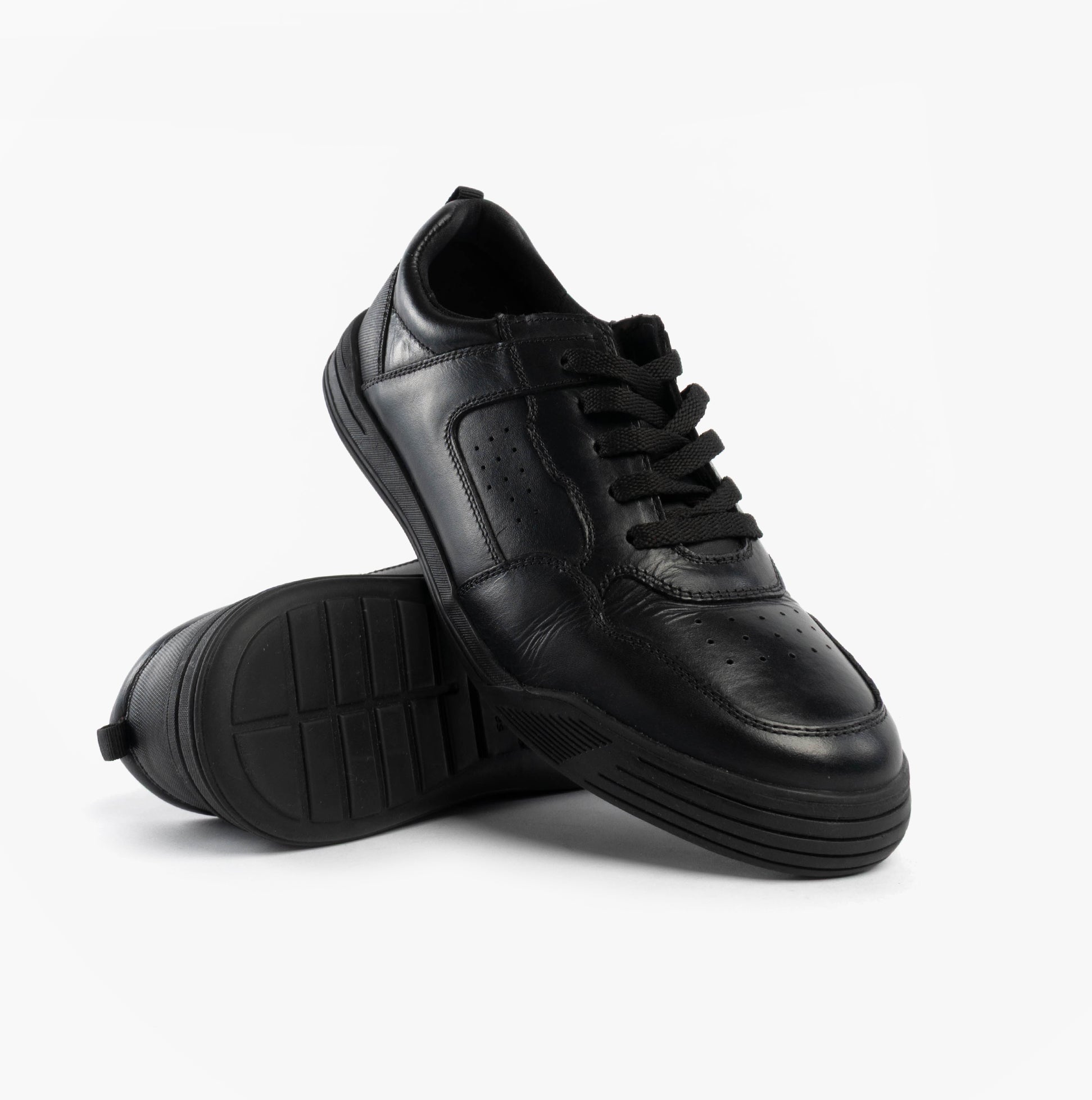 Hush Puppies SHANE SENIOR Boys Shoes Black side view showcasing lace-up design and low top silhouette.