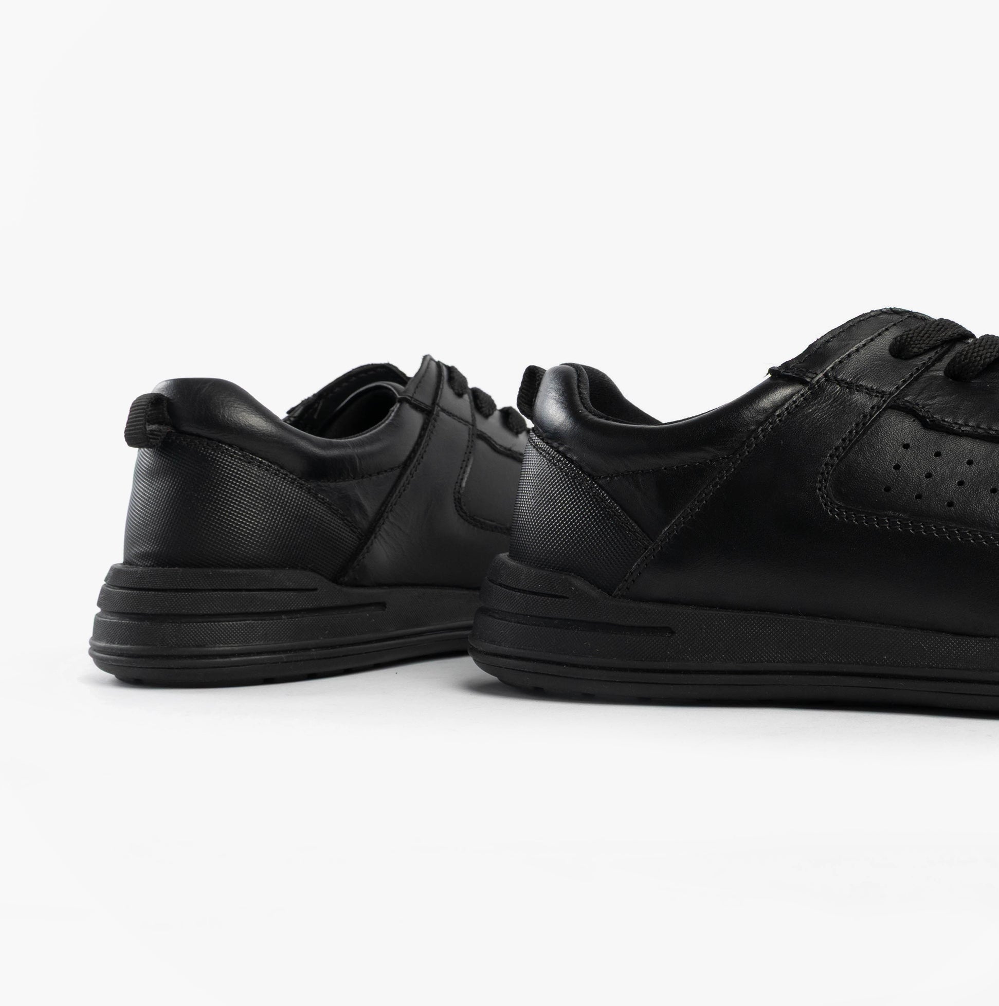 Hush Puppies SHANE SENIOR Boys Shoes Black rear side view showcasing black leather upper and lace-up design.