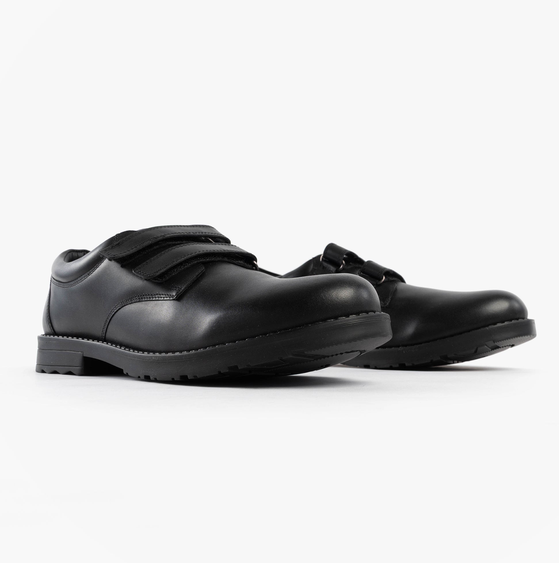 Hush Puppies BARRY Boys School Shoes Black, side view showing touch fasten straps and round toe design.