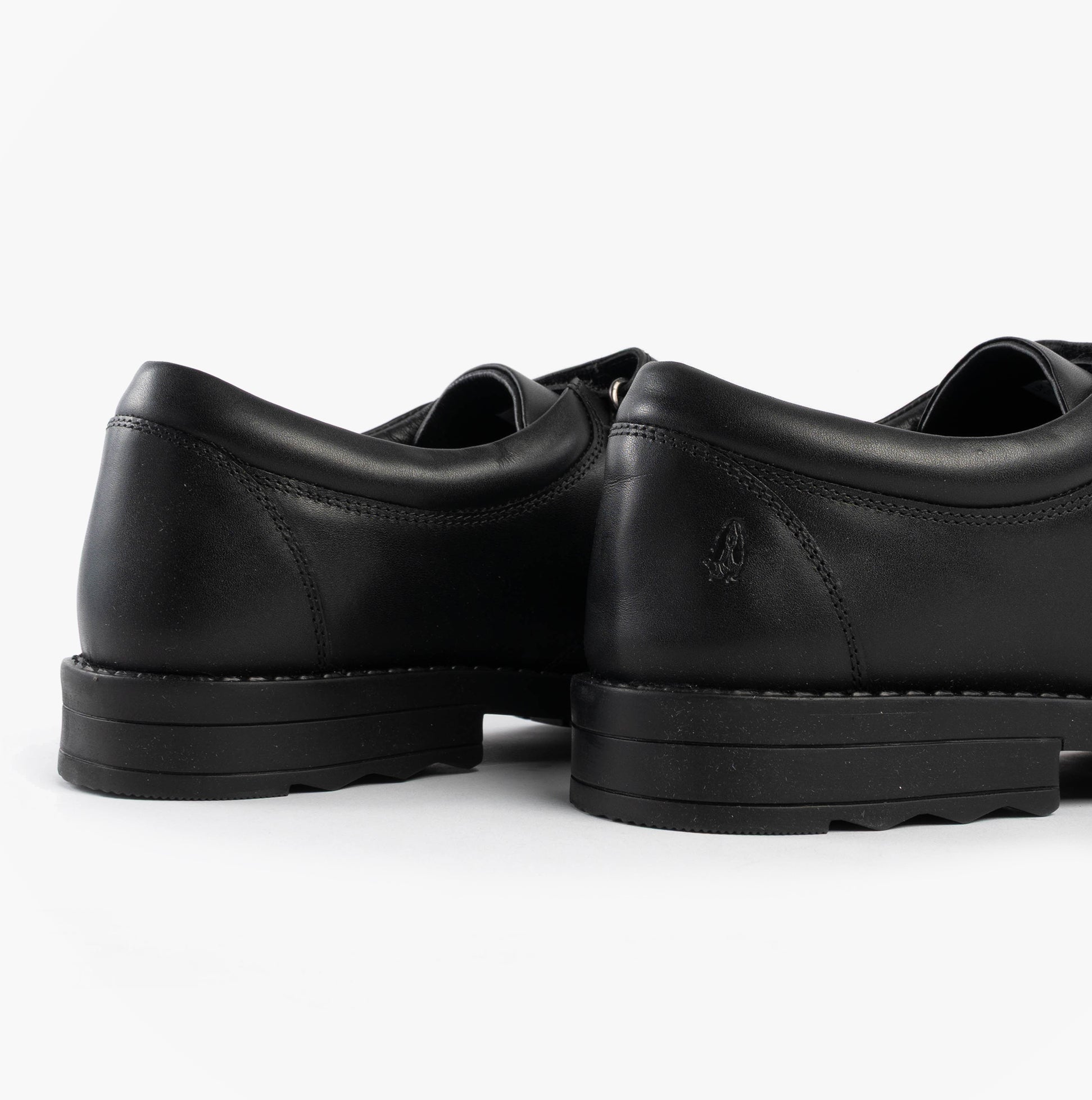 Hush Puppies BARRY Boys School Shoes Black rear view showcasing leather upper and rubber sole.