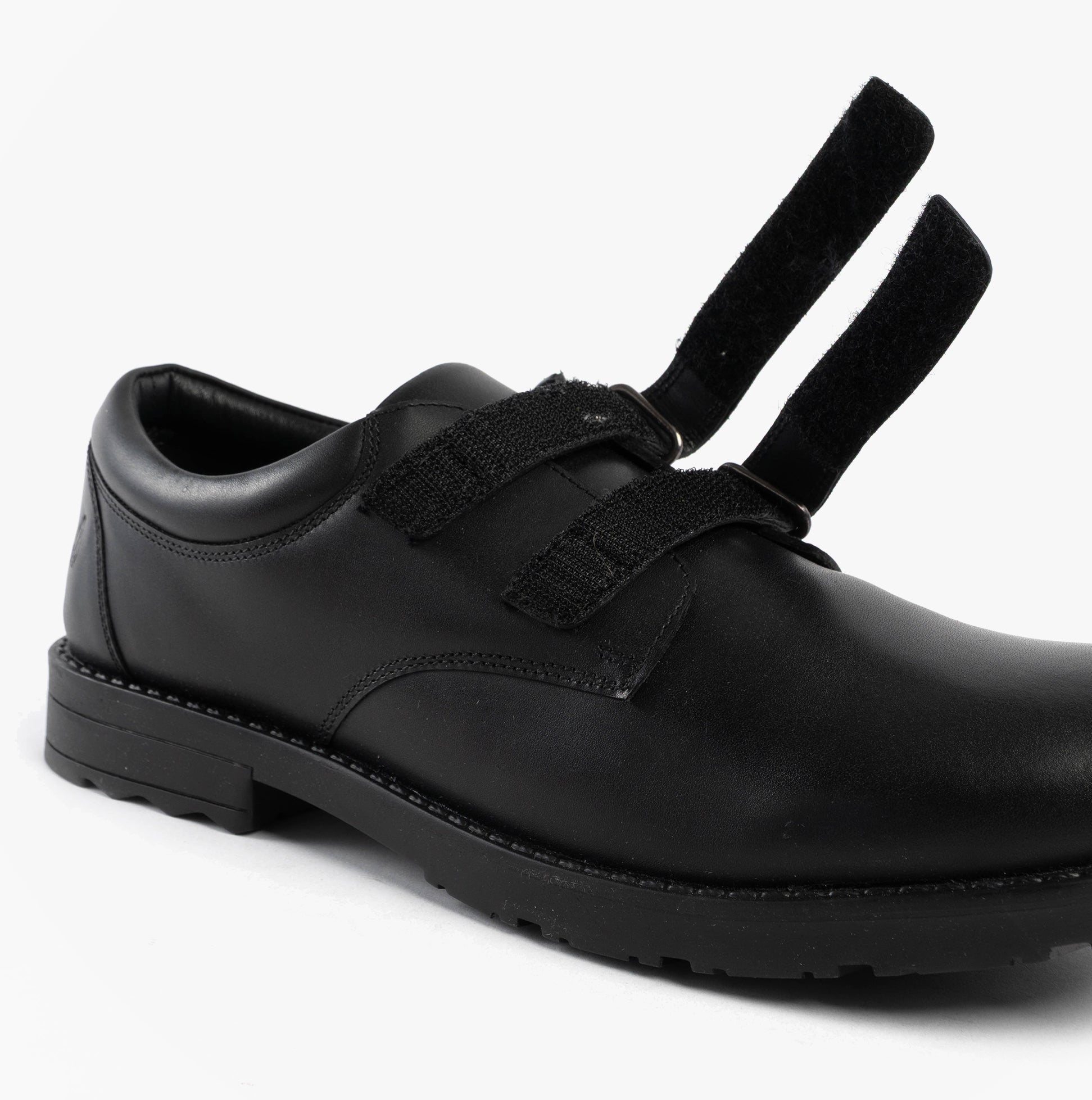 Hush Puppies BARRY Boys School Shoes Black side view with touch fasten closure and round toe design.