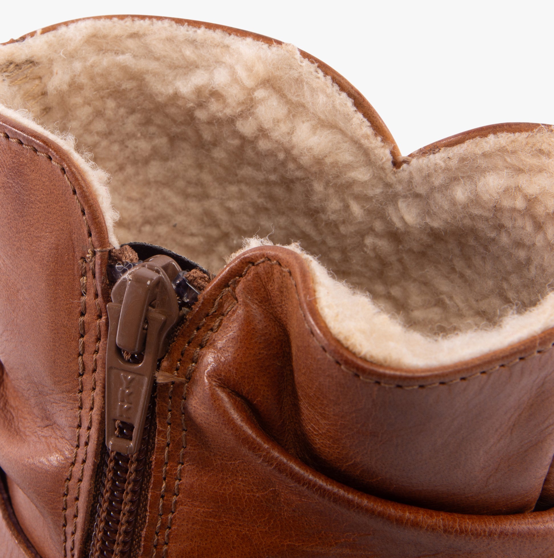 Hush Puppies PIPER Womens Boots Tan detail view of the warm lining and zip closure for added comfort.