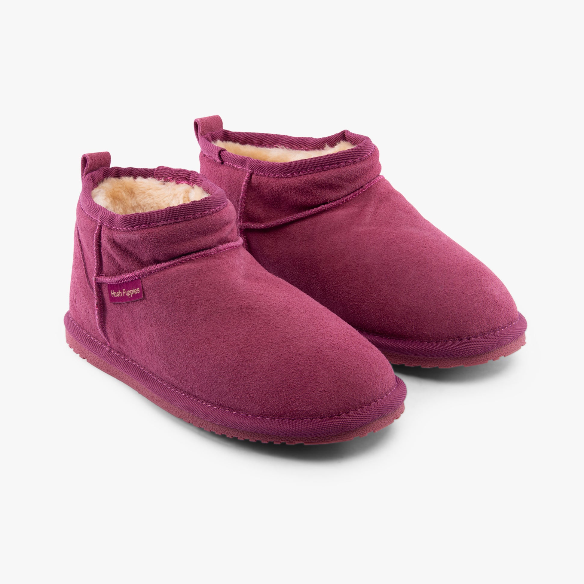 Hush Puppies ASHANTI Womens Slippers Pink side view showing suede upper and faux fur lining