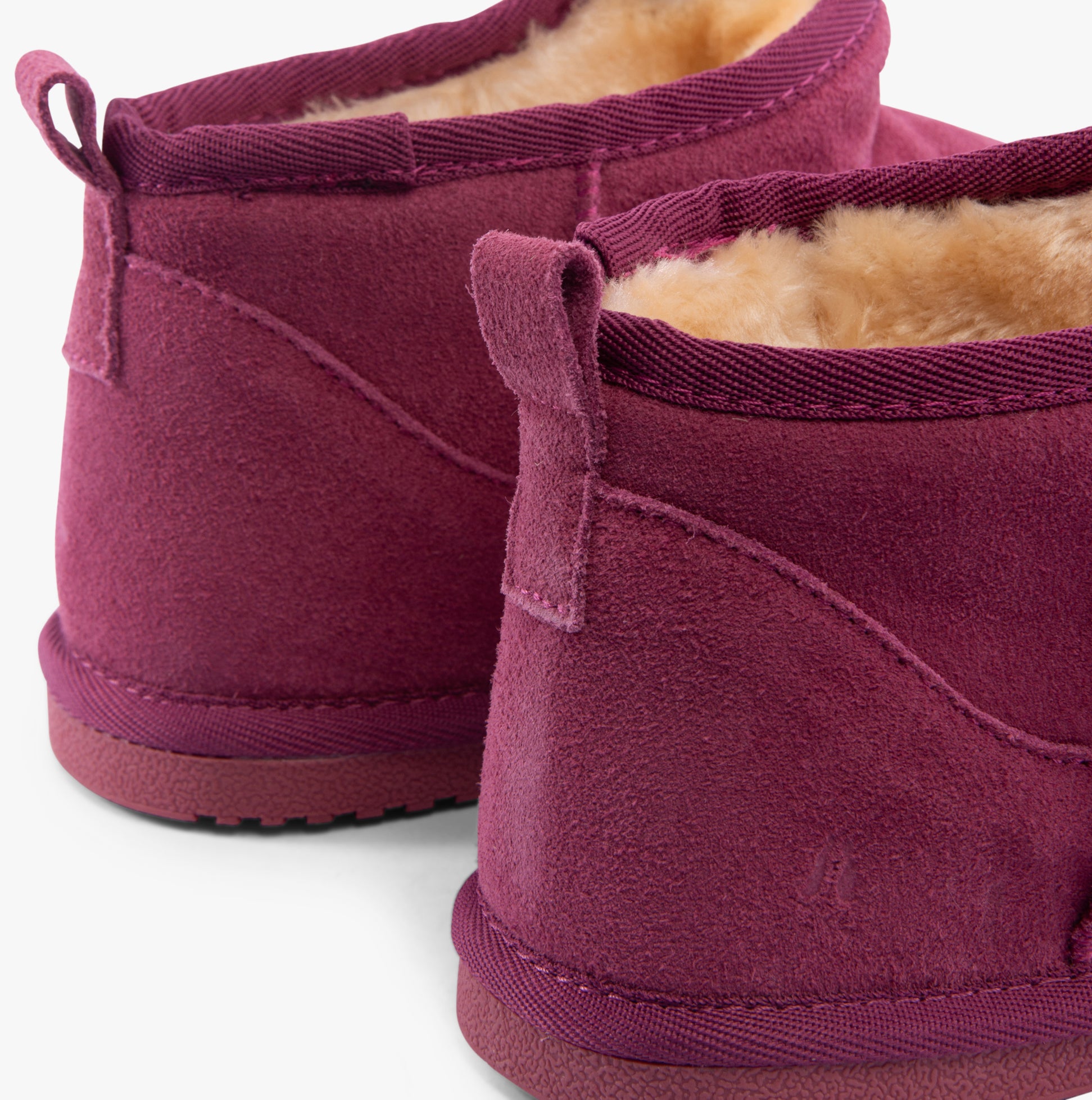 Hush Puppies ASHANTI Womens Slippers Pink back view showcasing suede material and faux fur lining.