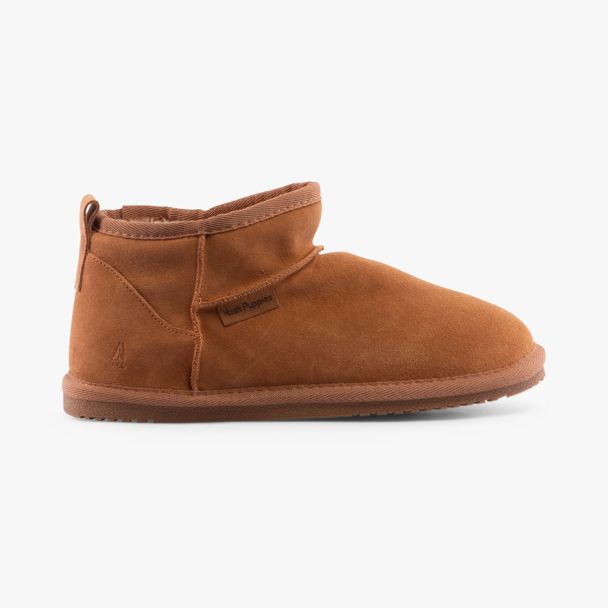 Hush Puppies ASHANTI Womens Slippers Tan side view soft suede slipper boots with round toe and pull-on design.
