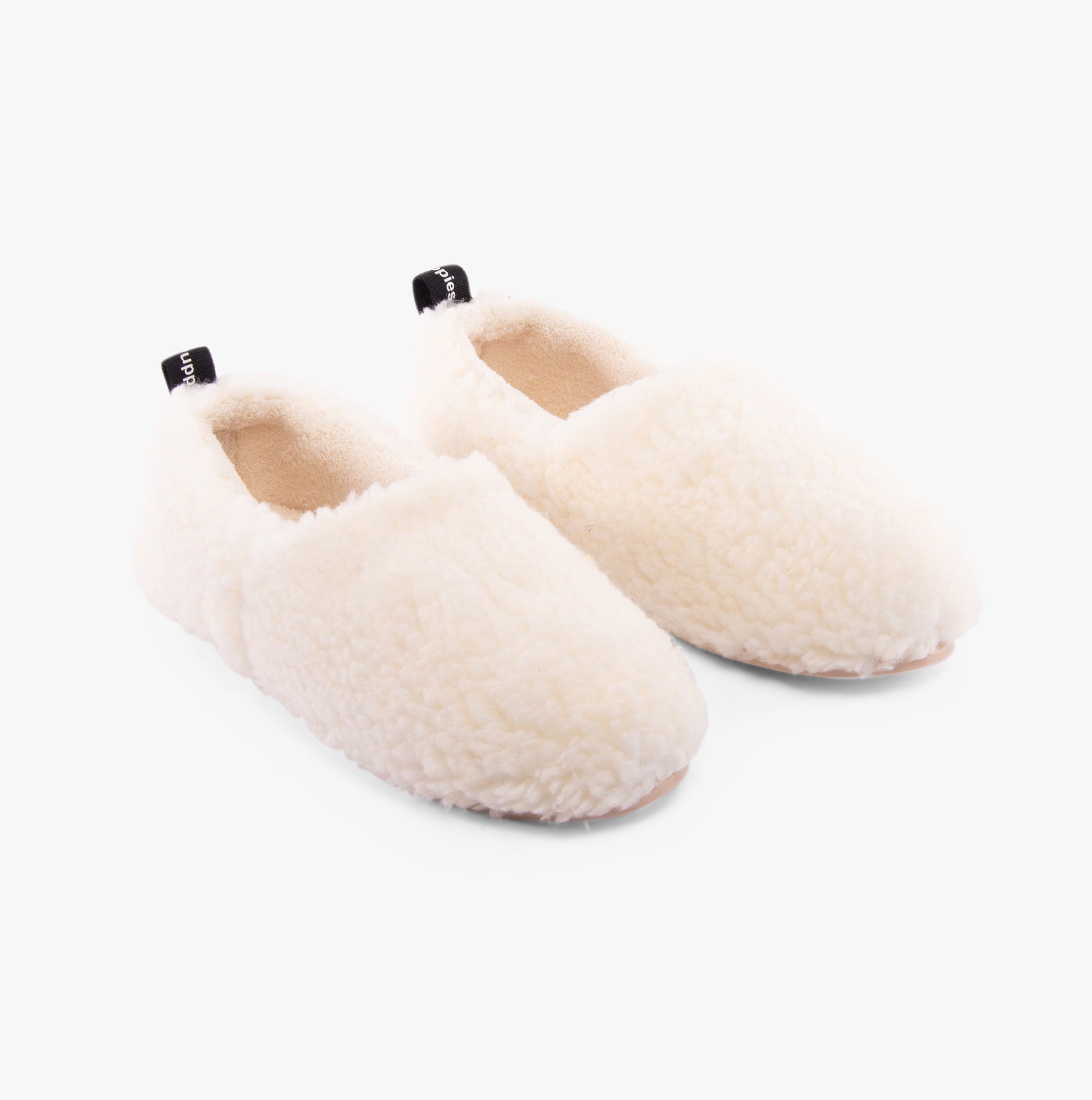 Hush Puppies EMILY Womens Slippers Cream side view showing cozy faux fur upper and slip-on style.
