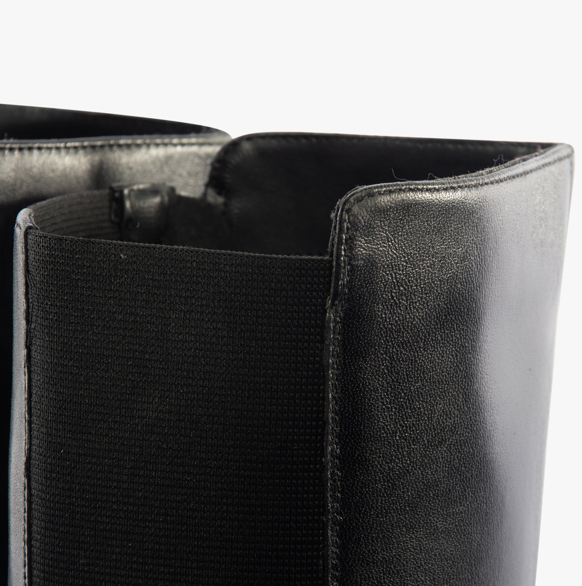 Detail view of Hush Puppies VICTORIA Womens Boots Black showing leather upper and elastic side panels.