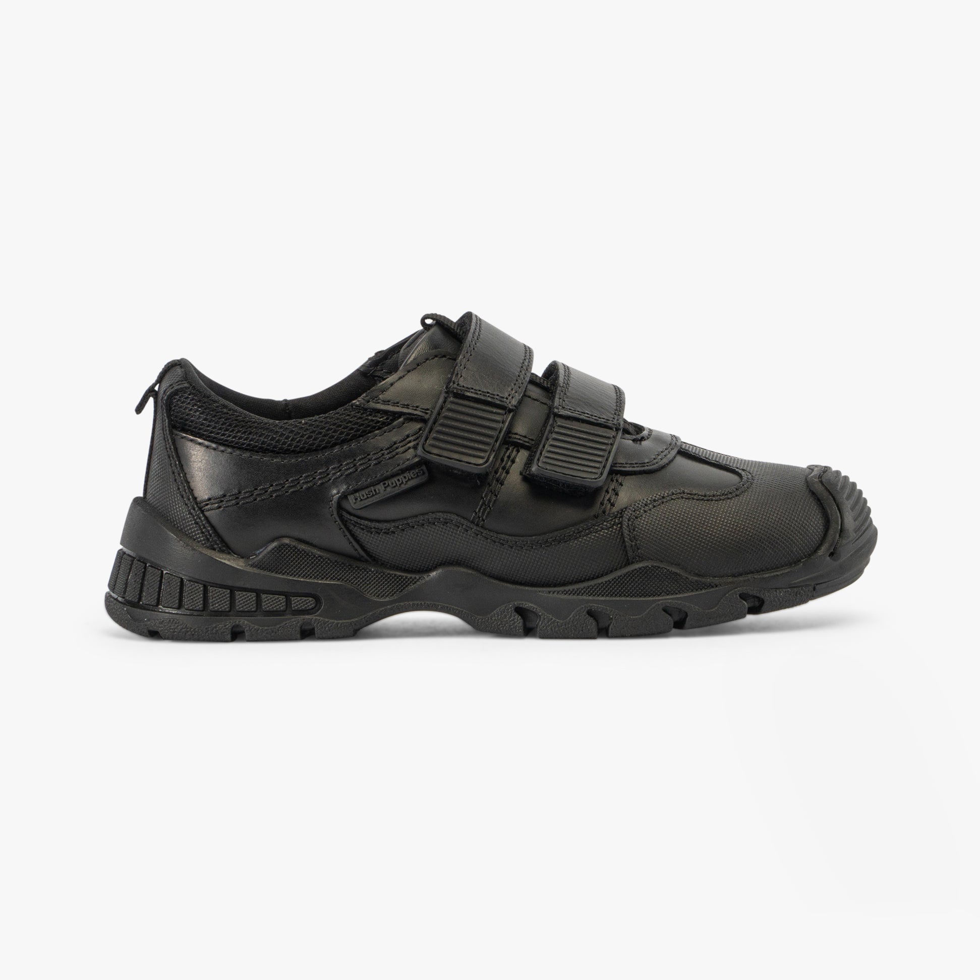 Hush Puppies TROY Boys School Shoes Black side view showcasing leather upper, touch fasten straps, and round toe design.