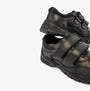 Hush Puppies TROY Boys School Shoes Black side view featuring black leather upper, touch fasten straps and low top design.