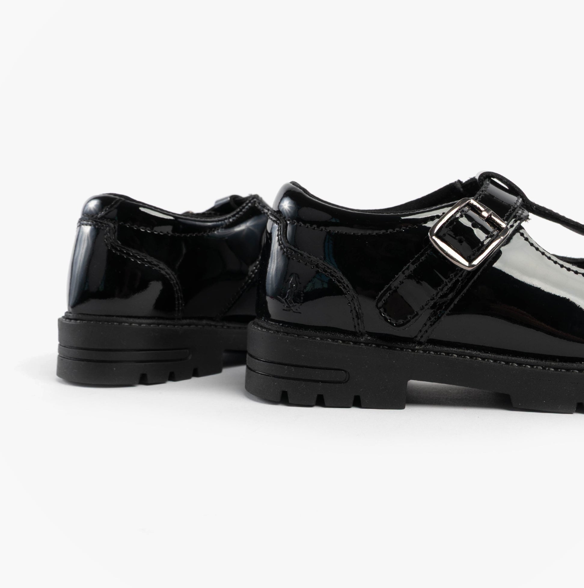 Hush Puppies FIONA Girls Leather School Shoes Patent Black side view showing glossy patent leather upper and buckle detail.