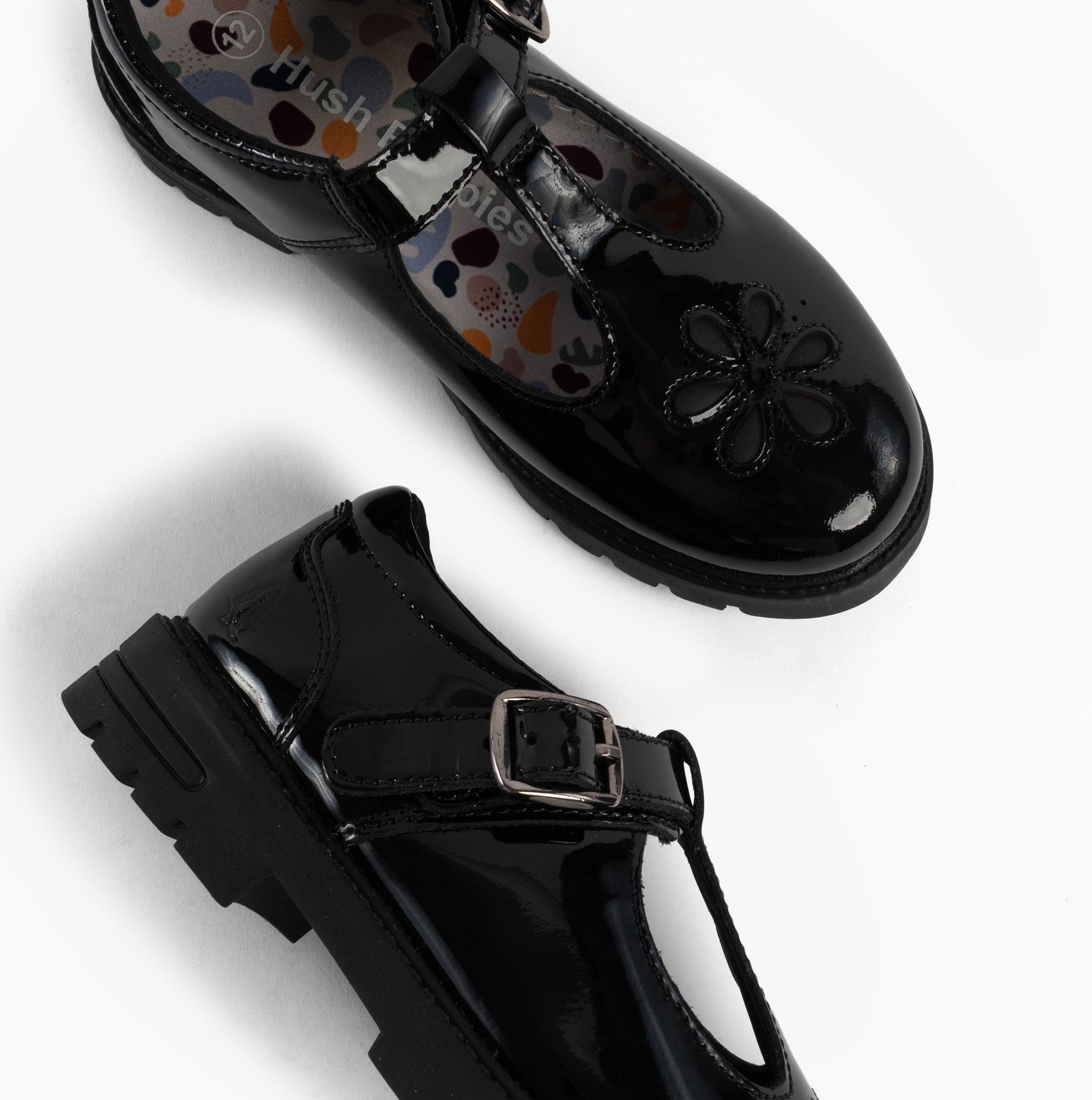 Hush Puppies FIONA Girls Leather School Shoes Patent Black top view showcasing buckle closure and floral design.