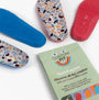 Hush Puppies Custom Fit Insoles with colorful insoles in blue, red, and patterned designs on a white background.