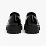 Hush Puppies MAXINE Girls School Shoes Black Patent rear view, showcasing shiny patent leather and durable sole.