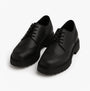 Hush Puppies MAXINE Girls Leather School Shoes Black front view, featuring lace-up design and round toe.
