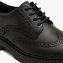 Hush Puppies MAXINE Girls Leather School Shoes Black detail view of lace-up design and brogue detailing.