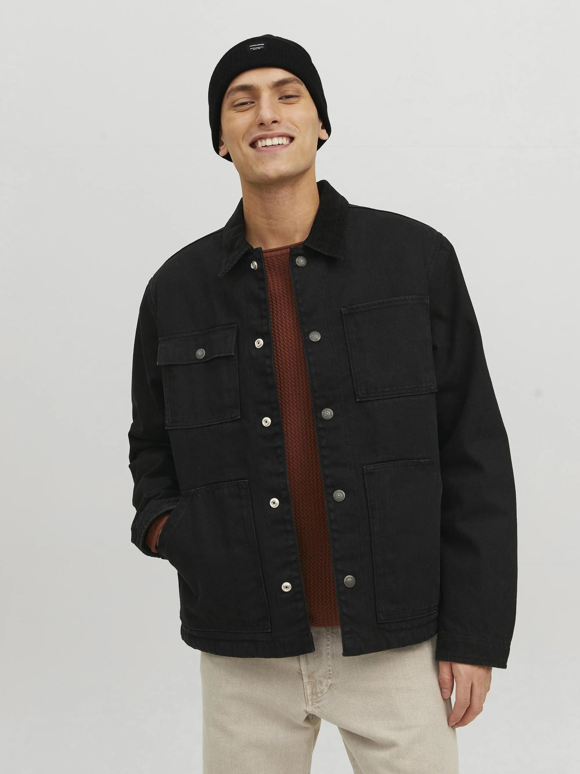 Jack & Jones DNA Mens Beanie Black worn with a black jacket, front view, casual style.
