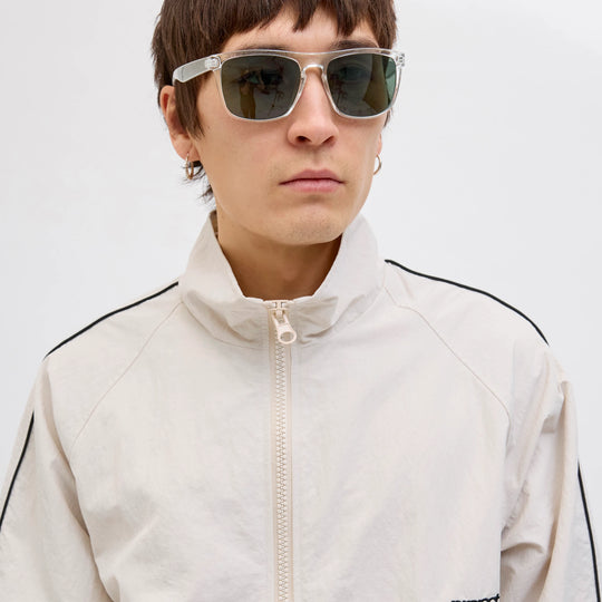 Jack & Jones RYDER Mens Sunglasses Blanc de Blanc front view on model with light jacket.