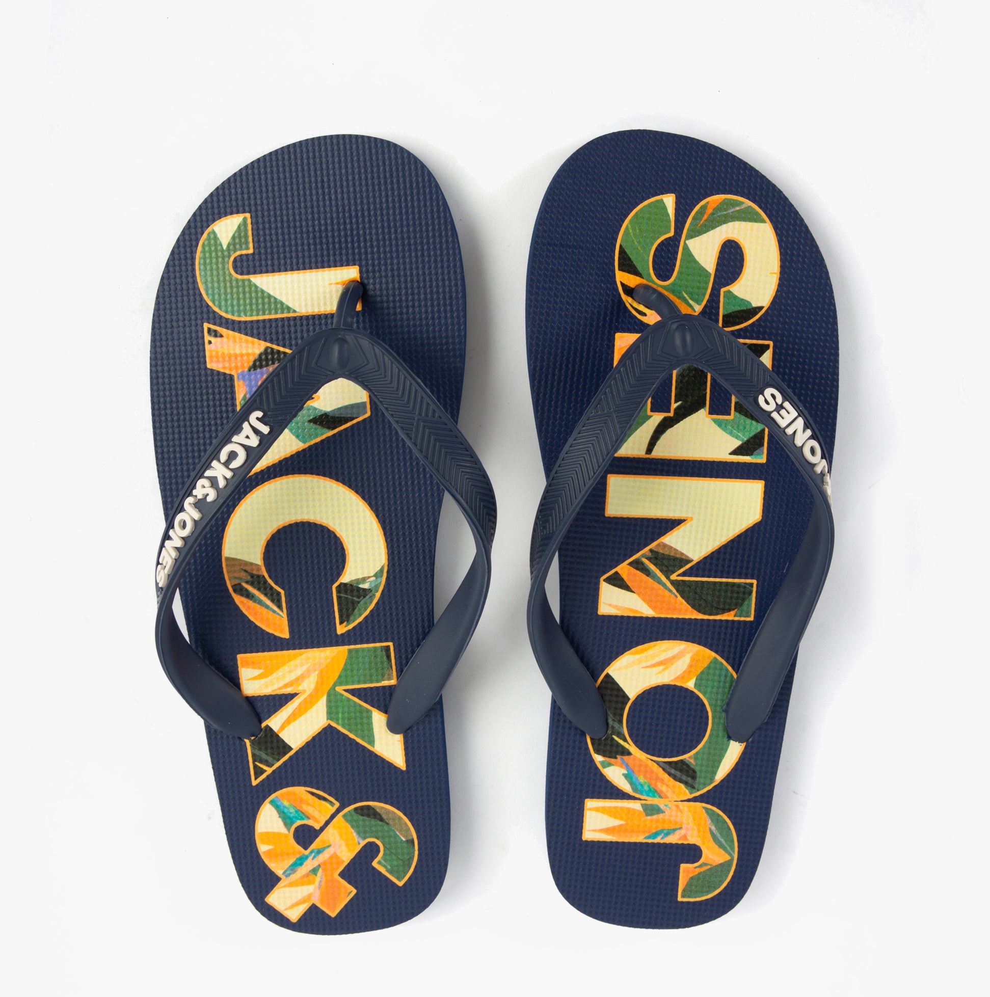 Jack & Jones LOGO PALM PRINT Mens Flip-Flops Medieval Blue top view showcasing vibrant logo design and slip-on style.