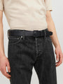 Jack & Jones ROMA Mens Belt Black front view worn with black jeans, showing adjustable buckle and leather material.