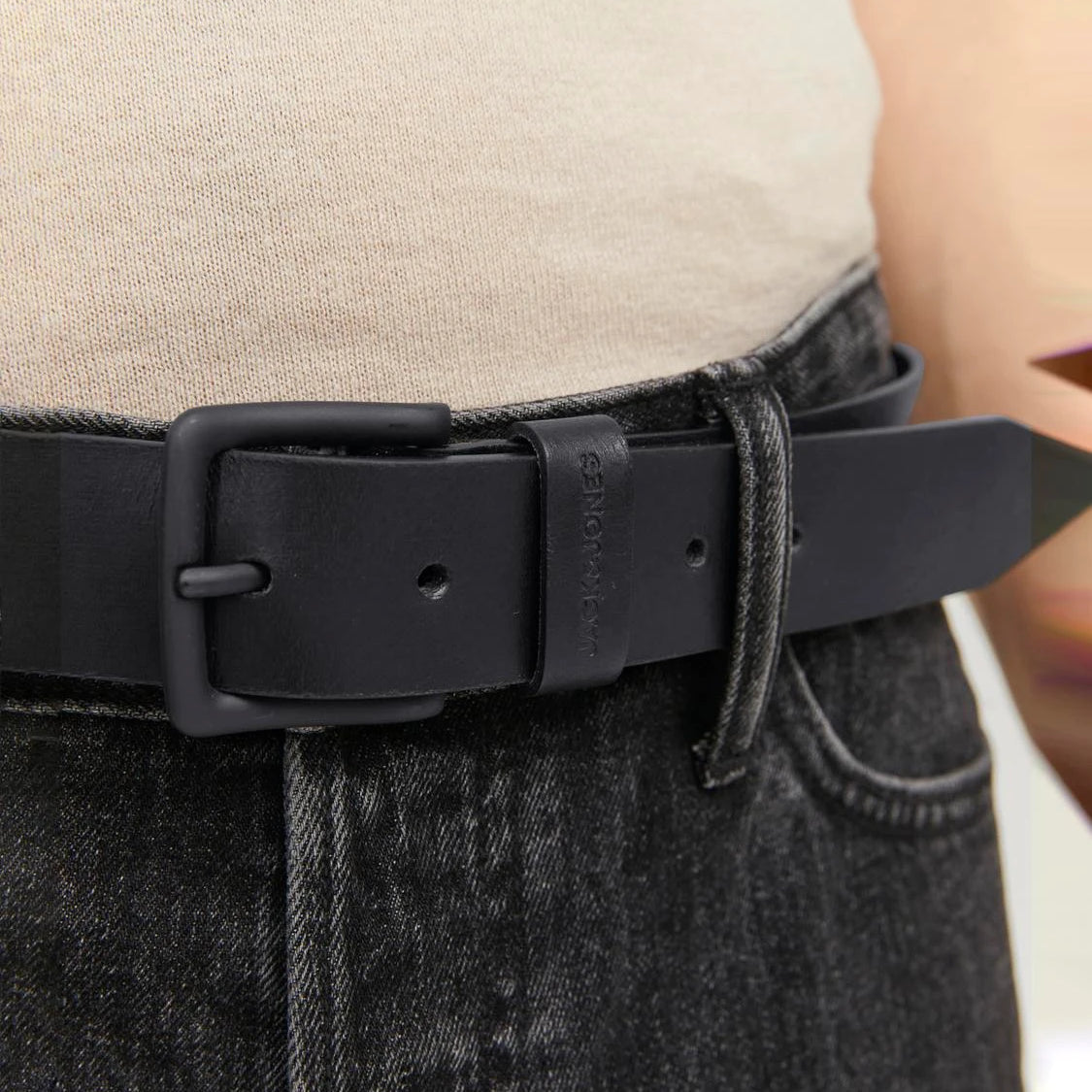 Jack & Jones ROMA Mens Belt Black detail view showing buckle and adjustable strap on black jeans.
