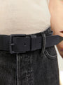 Jack & Jones ROMA Mens Belt Black detail view showing buckle and adjustable strap on black jeans.