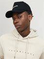 Jack & Jones VESTERBRO Mens Cap Black worn by model in front view, showcasing stylish cotton design.