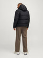 Jack & Jones WORLD Mens Puffer Jacket Black back view on model wearing light brown trousers.