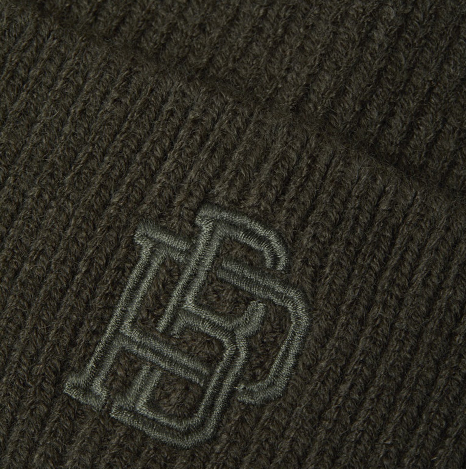 Jack & Jones TRAIN Mens Hat & Gloves Set Peat detail view of beanie with logo in dark green.