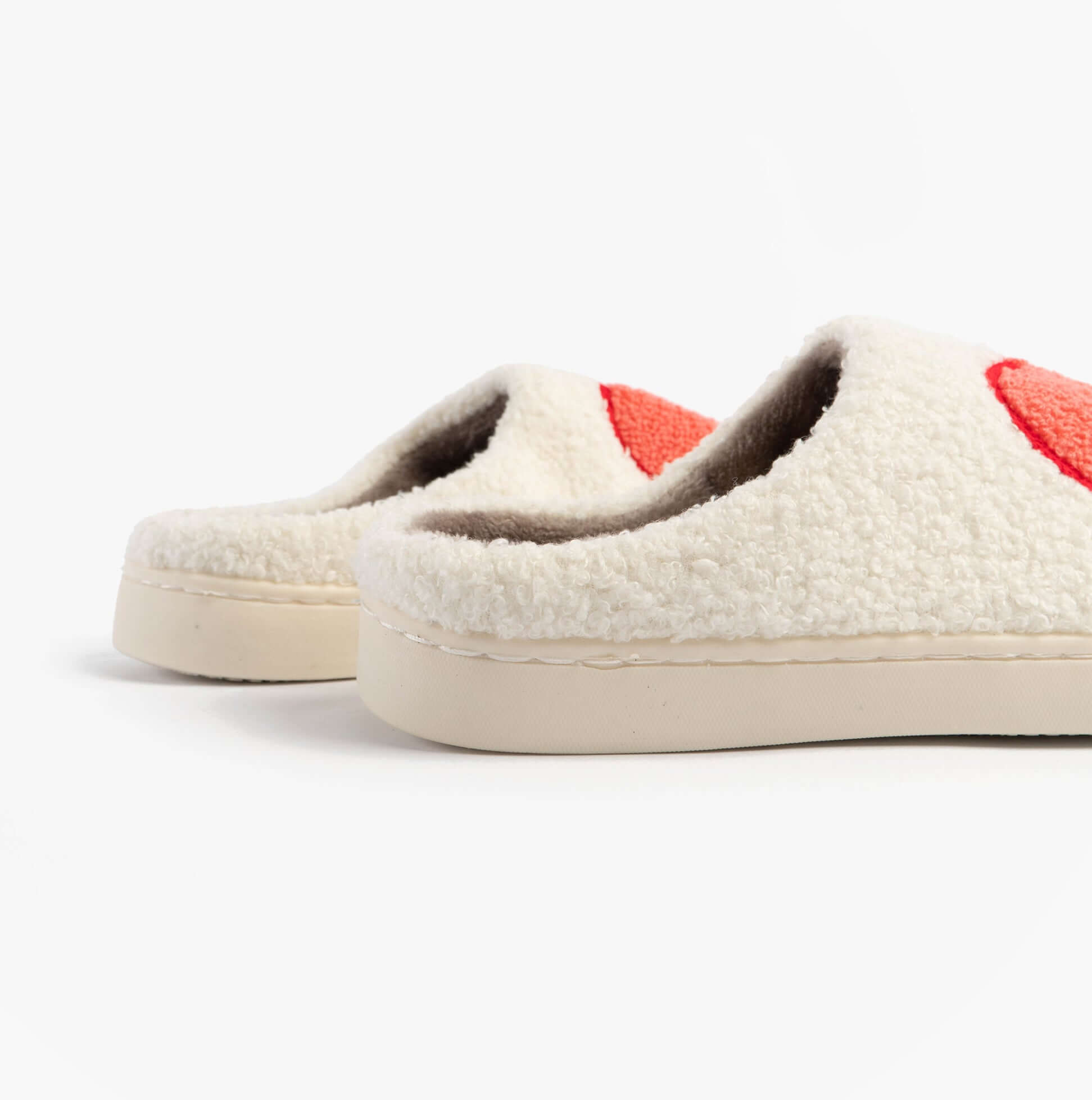 Jo & Joe AMOUR Womens Mule Slippers Cream side view showcasing textured upper and cushioned sole.
