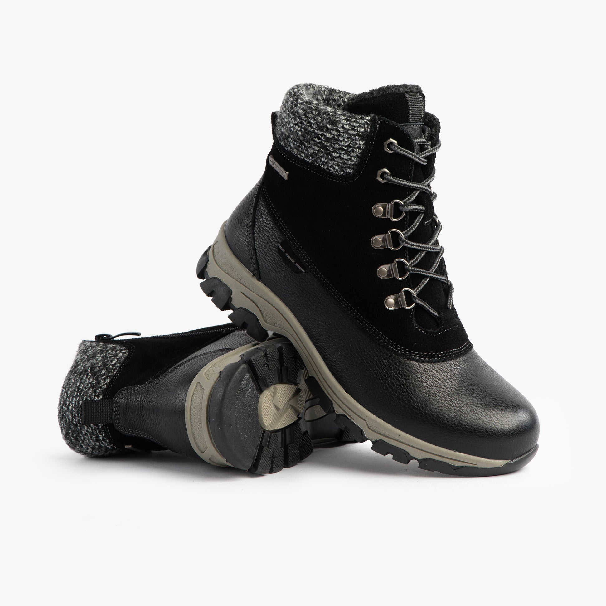 Josef Seibel WYNTER 02 Womens Waterproof Lace Up Boots Black side view showing laces and rubber soles.