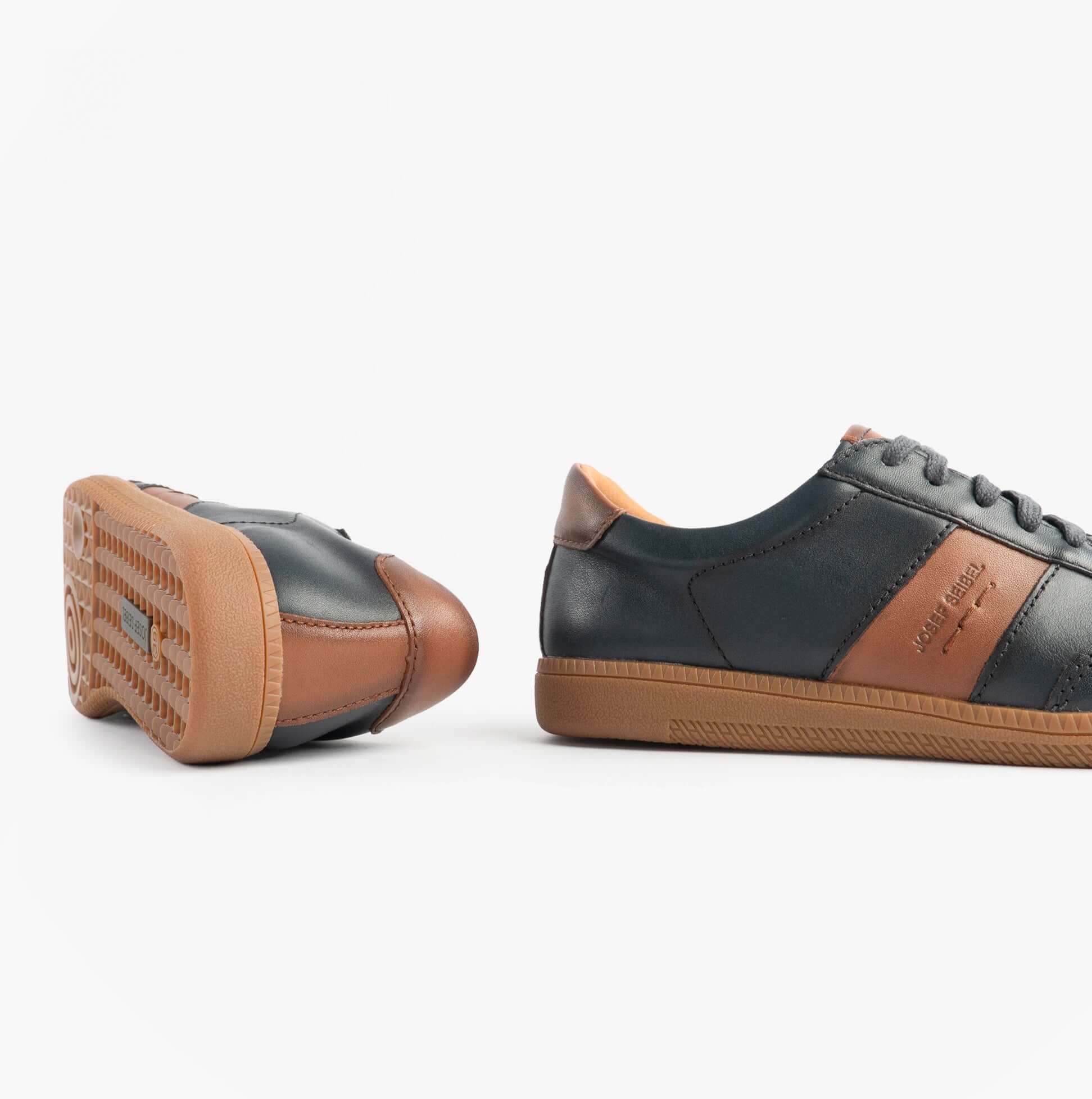 Josef Seibel JOLEEN 03 Womens Court Trainers Navy side and back view with brown accents and rubber soles.