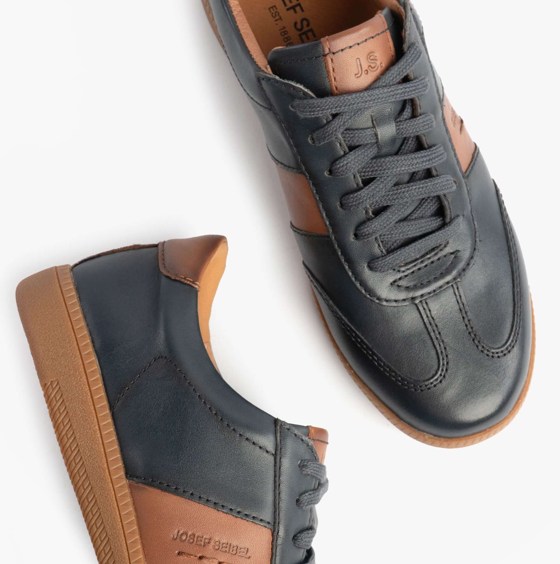Josef Seibel JOLEEN 03 Womens Court Trainers Navy side view showcasing leather upper and lace-up design.