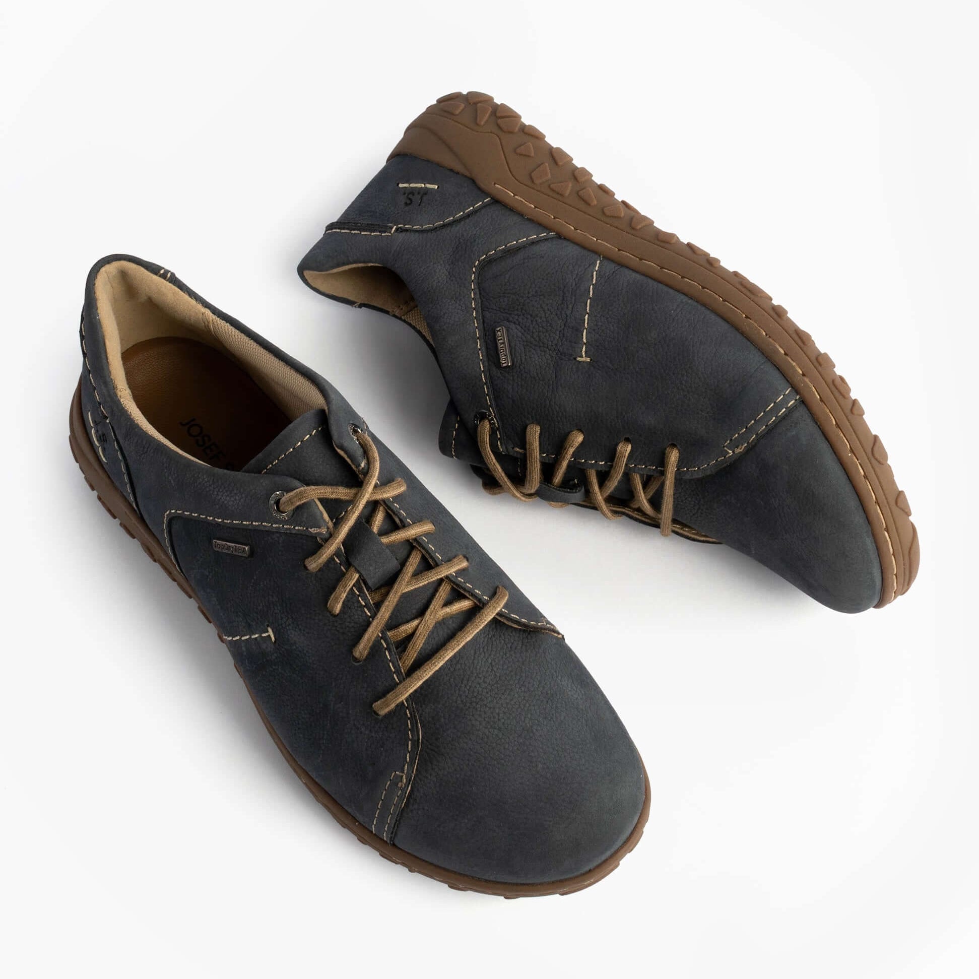 Josef Seibel RUBY 50 Womens Lace Up Casual Shoes Indigo Blue side view with brown sole showcasing lightweight and waterproof features.