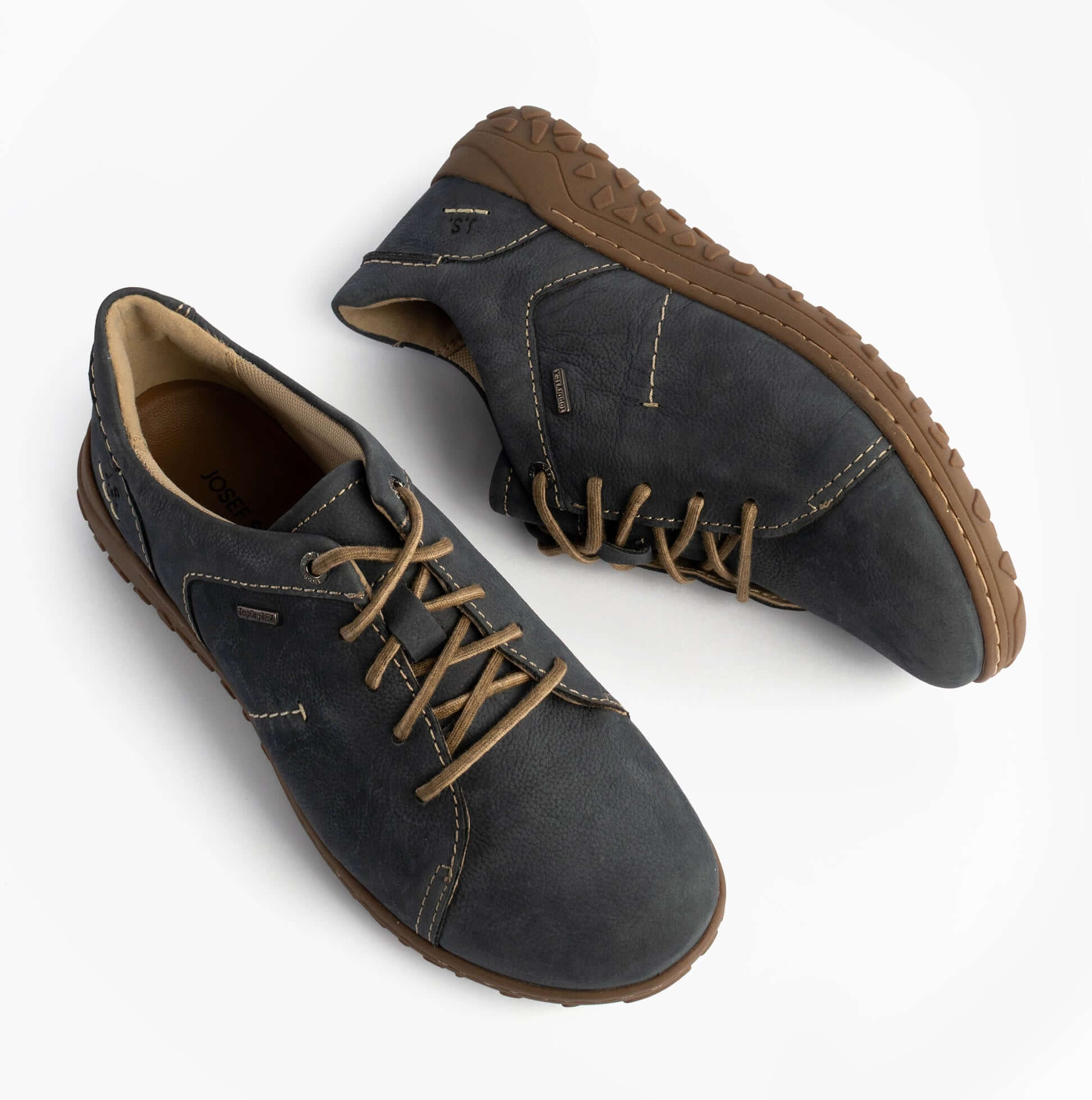 Josef Seibel RUBY 50 Womens Lace Up Casual Shoes Indigo Blue side view with brown sole showcasing lightweight and waterproof features.