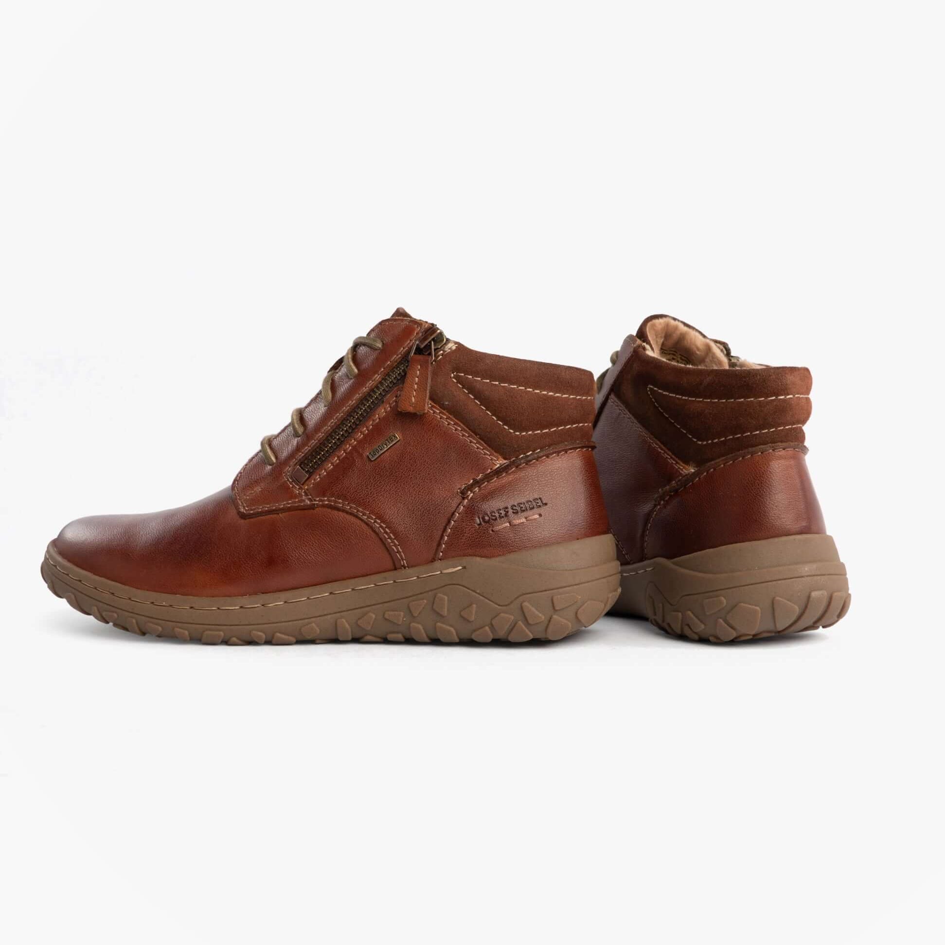 Josef Seibel RUBY 54 Ladies Boots Castagne Brown side view showcasing leather upper and rubber sole.