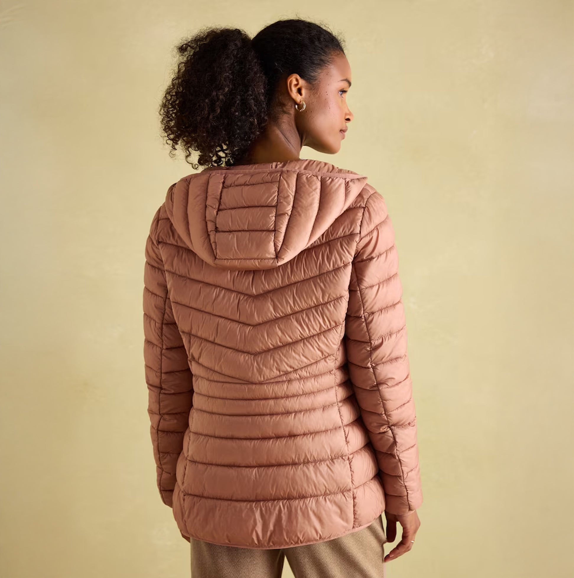 Joules KENLEY Womens Showerproof Hooded Puffer Jacket Pink back view showcasing padded design and hood.