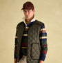 Joules GIBSON Mens Gilet Green front view, diamond quilted design, sleeveless style, featuring a corduroy-trimmed pocket.