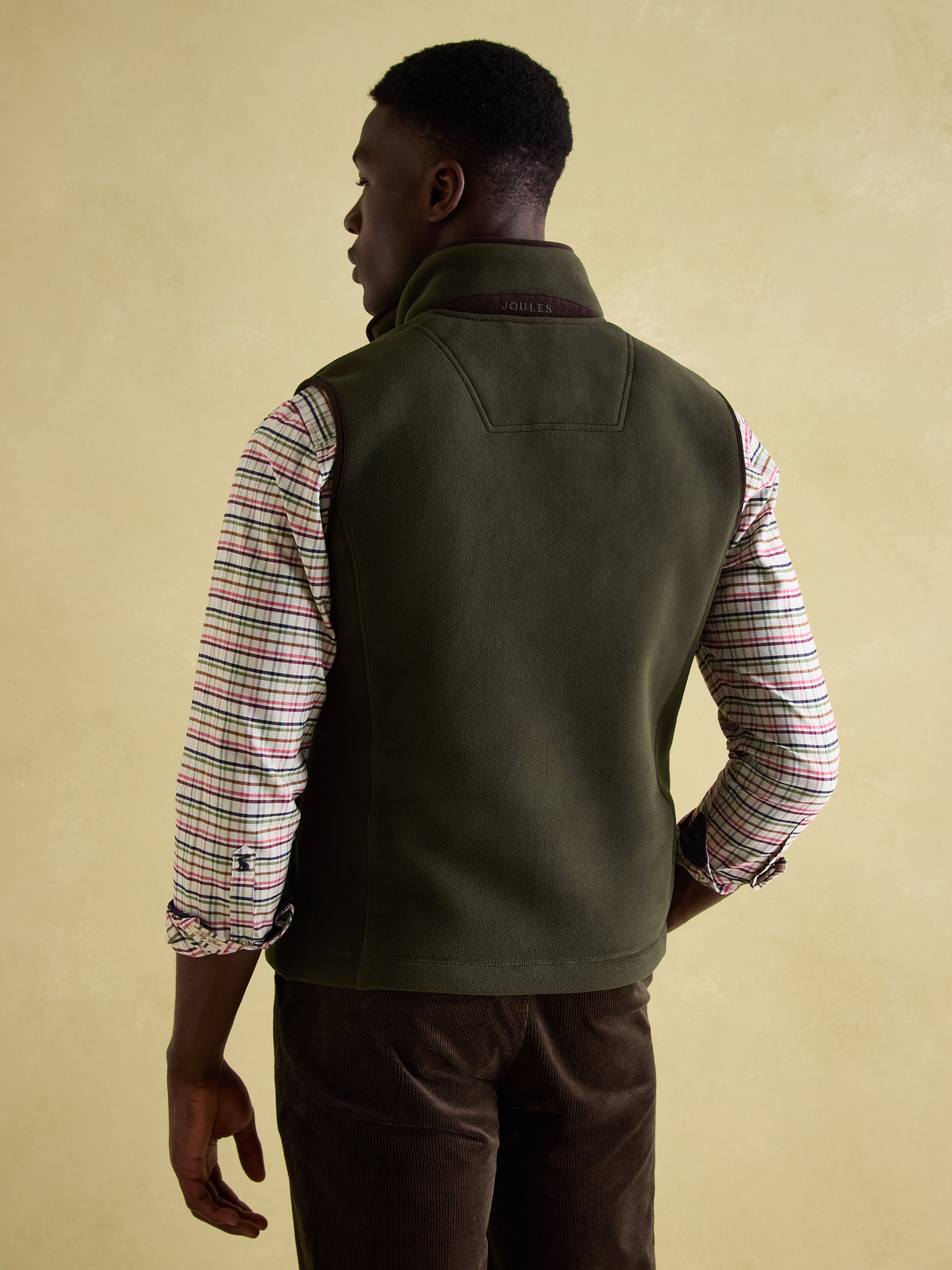 Joules GREENFIELD Mens Gilet Green, back view, showcasing funnel neck and adjustable waist.